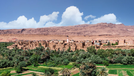 Tinghir, sometimes known as Tinerhir, is a city in Morocco, nestled in the High Atlas Mountains. It's known for its scenic beauty, with lush green oases and the Todgha Gorgeの写真素材