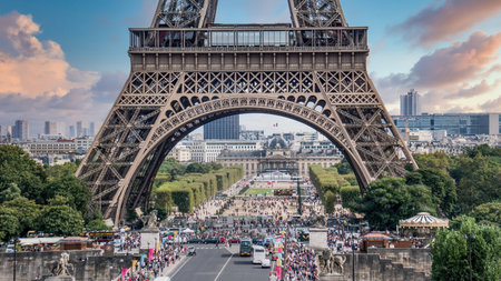 Paris, France - 12 September 2016: Closeup of Eiffel Tower with tourists and people visiting in Paris with a blue cloudy skyのeditorial素材