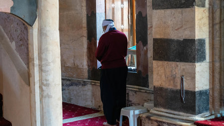 Gaziantep, Turkey - 16.10.2022: Religious Muslim man praying inside the Seyh Fethullah Mosqueのeditorial素材