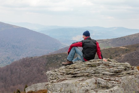 Tourists climb to the top of Runa mountain in Carpathians. Ukraine