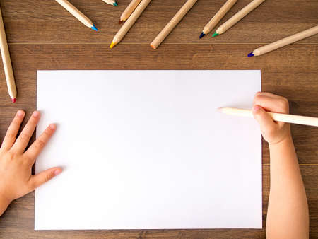 Empty sheet of paper on dark backgroundの写真素材