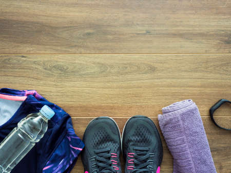 Running background concept on wooden background, directly above with copy spaceの写真素材