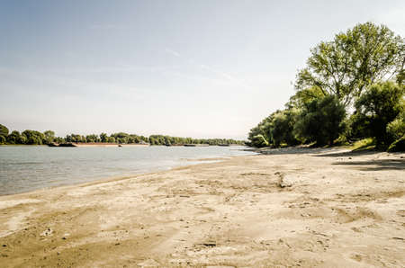Sandy bank of the Danube river, near Petrovaradin, Novi Sad, Serbia. Panorama of the sandy banks of the Danube,の写真素材