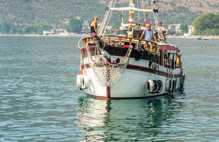Herceg Novi, Montenegro - August 23, 2021: Wooden, tourist boat in the Bay of Kotor.のeditorial素材