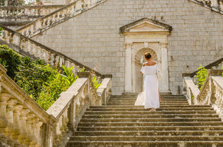 Montenegro - August 23, 2021: Stone staircase of the Church of the Nativity of the Most Holy Mother of God in Prcanj.のeditorial素材