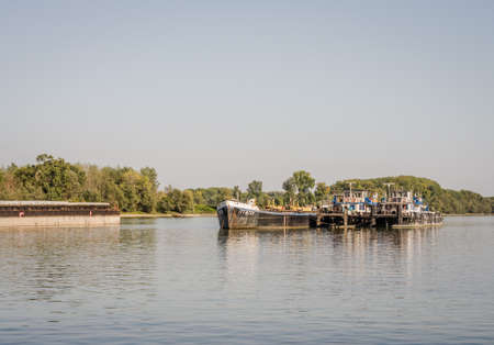 Anchored Tankers on the Danube River in Petrovaradin near the city of Novi Sad.のeditorial素材