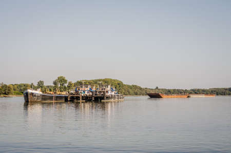Anchored Tankers on the Danube River in Petrovaradin near the city of Novi Sad.のeditorial素材