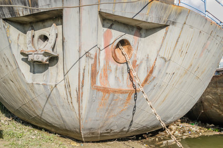A stranded ship on the bank of the Danube river. View of the bow of a stranded ship on the bank of the Danube.の写真素材