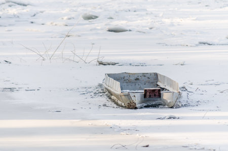 Frozen, snow-covered banks of the Danube River below the Petrovaradin Fortress, Vojvodina, Novi Sad, Petrovaradin, Serbia.の写真素材
