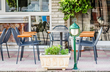 Chairs in the garden restaurant in Leptokarya, Greece.の写真素材