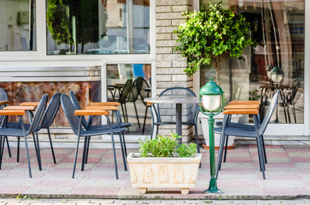 Chairs in the garden restaurant in Leptokarya, Greece.の写真素材