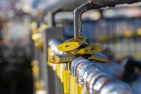 Petrovaradin, Serbia - January 15. 2023: Petrovaradin fortress; Padlocks of love on the fence