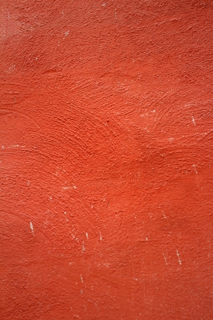 Soft red wall is used for background.