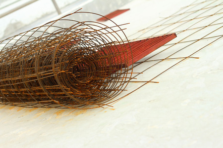 steel grating red on a white background.の写真素材