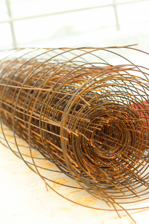 steel grating red on a white background.の写真素材