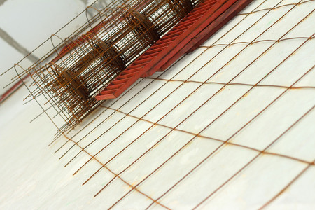 steel grating red on a white background.の写真素材