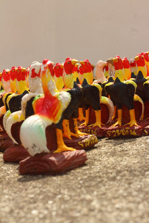 colorful of cocks statue at the templeの写真素材