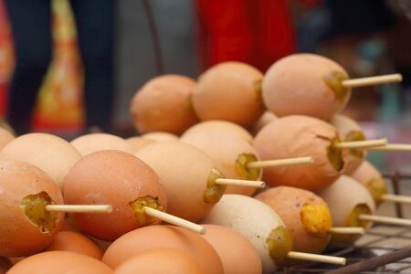 Grilled chicken eggs on the stove.の写真素材