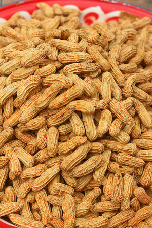 Boiled peanuts in tray at the marketの写真素材