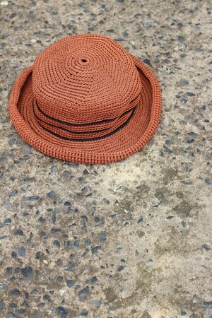 Brown hat on a background of cement.の写真素材