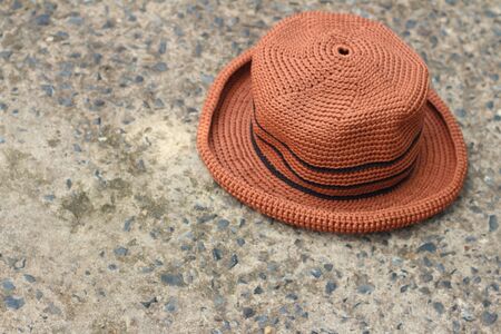 Brown hat on a background of cement.の写真素材