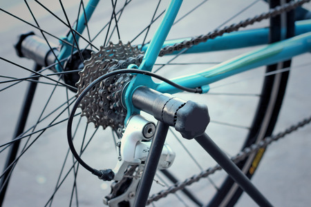 Sprocket of bikes parked at the park.の写真素材