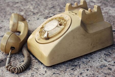 brown old phone vintage style on a floor