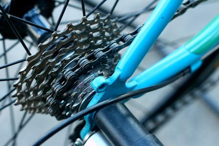 Sprocket of bikes parked at the park.