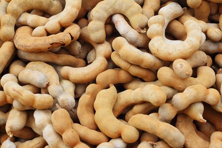 fruit tamarind on a table in the marketの写真素材