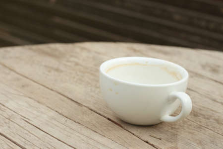 Coffee white cup is then used on a background of wooden