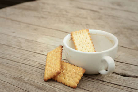 Tasty of crackers on a wood tableの写真素材