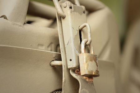 lock of the door locked with padlock.の写真素材