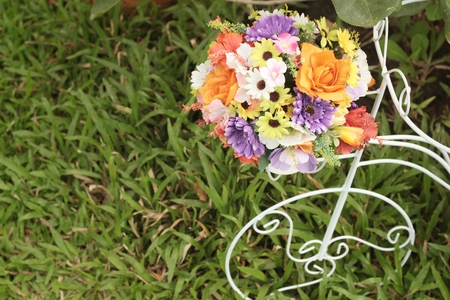 Flowers in car pot in the gardenの写真素材
