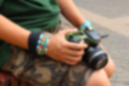 Blurred image of a woman taking photoの写真素材