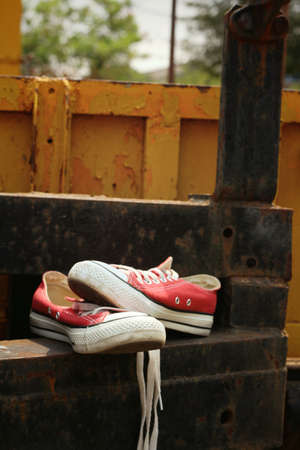 Red shoes on a background of steelの写真素材