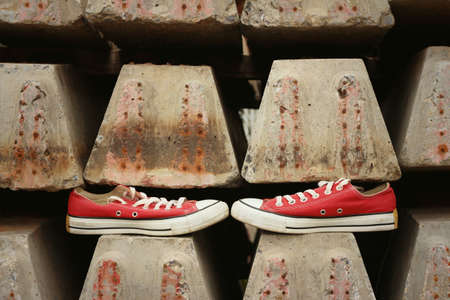 Red shoes on the floor of cement.の写真素材