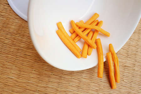 bread sticks on background of brown wood.