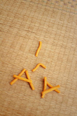 bread sticks on background of brown wood.の写真素材