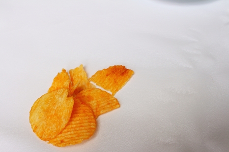 Potatoes sheet on a background of whiteの写真素材