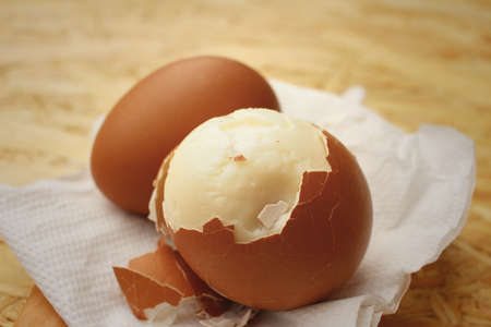 Boil eggs on background of brown wooden.