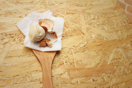 Boil eggs on background of brown wooden.の写真素材