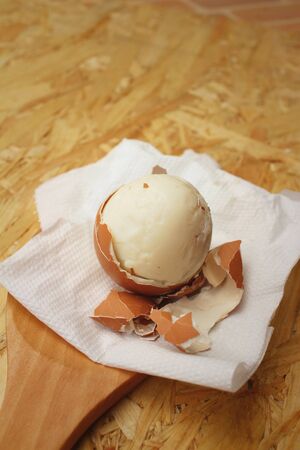 Boil eggs on background of brown wooden.