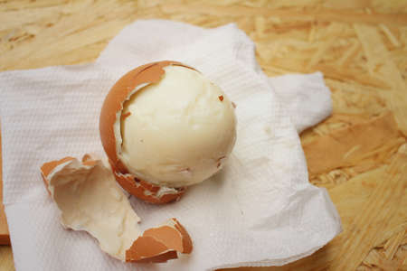 Boil eggs on background of brown wooden.