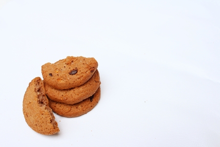 Chocolate chip cookies on background of white.