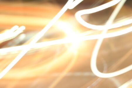 Blurred of car in city at nightの写真素材