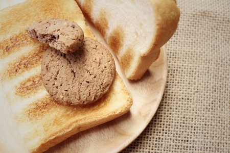 Cookies with breads on background of brown.の写真素材
