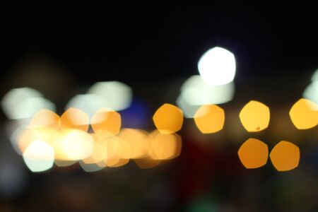 Blurred of car in city at nightの写真素材