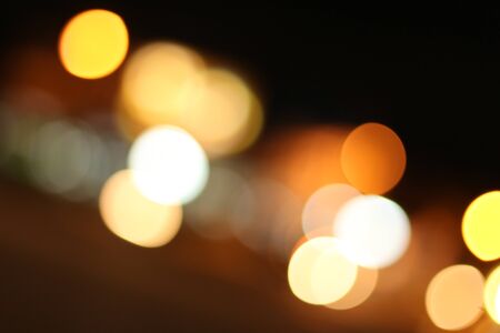 Blurred of car in city at nightの写真素材