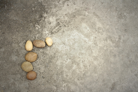 Stones background on cement background at the parkの写真素材