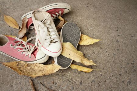 Red and white shoes on background of cement.の写真素材